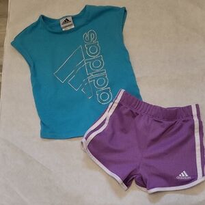 Adidas blue tank top with violet shorts